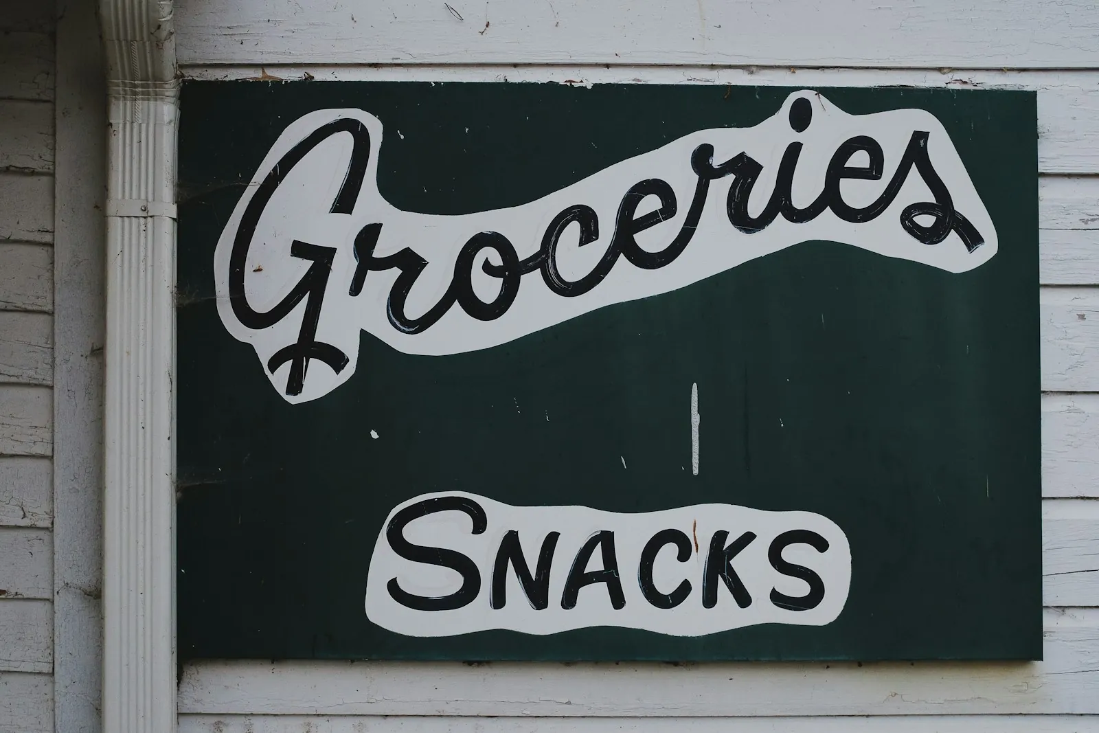 Hand-painted Groceries and Snacks shop sign